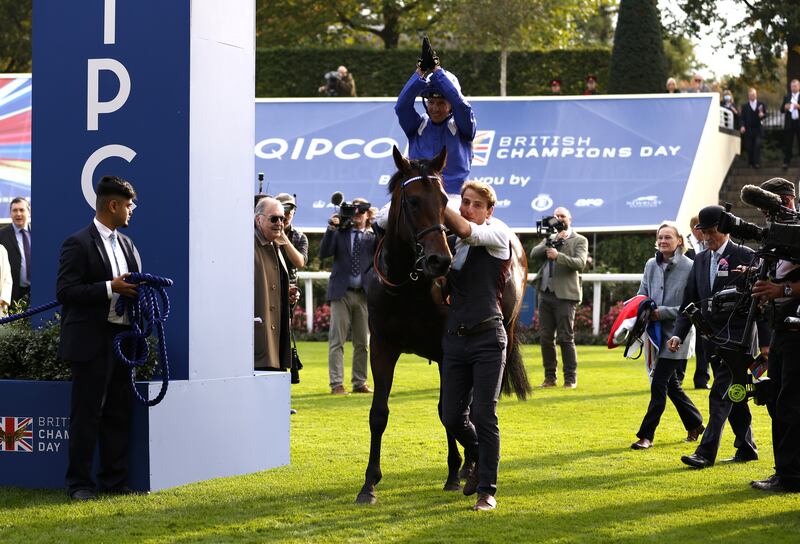 Jockey Jim Crowley celebrates with Baaeed after winning the Queen Elizabeth II Stakes at Ascot on October 16, 2021. PA