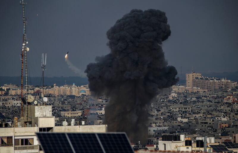 Black smoke rises after an Israeli air strike in Gaza city. EPA