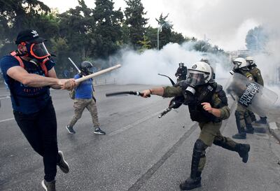 Protesters clash with police during a demonstration against the agreement reached by Greece and Macedonia to resolve a dispute over the former Yugoslav republic's name, during the opening of the annual International Trade Fair of Thessaloniki by Greek Prime Minister Alexis Tsipras in Thessaloniki, Greece, September 8, 2018. REUTERS/Alexandros Avramidis      TPX IMAGES OF THE DAY