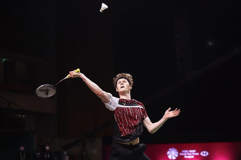 Denmark's Anders Antonsen hits a shot against Wang Tzu-wei of Taiwan during their men's singles semi-finals match at the World Tour Finals badminton tournament in Bangkok on Saturday, January 30. AFP