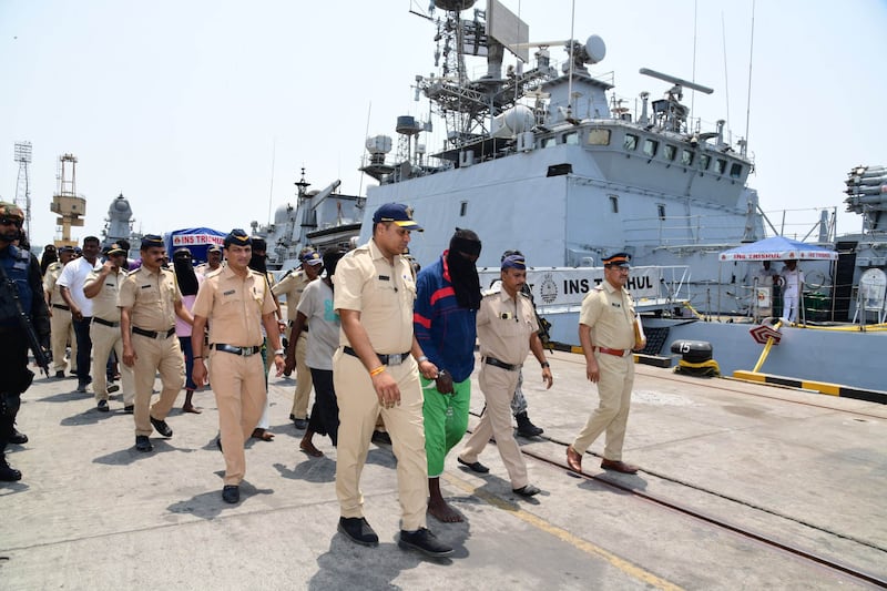 India brought nine alleged Somali pirates to Mumbai for trial over charges of hijacking an Iranian fishing vessel last month and keeping its Pakistani crew hostage. Photo: Indian Navy