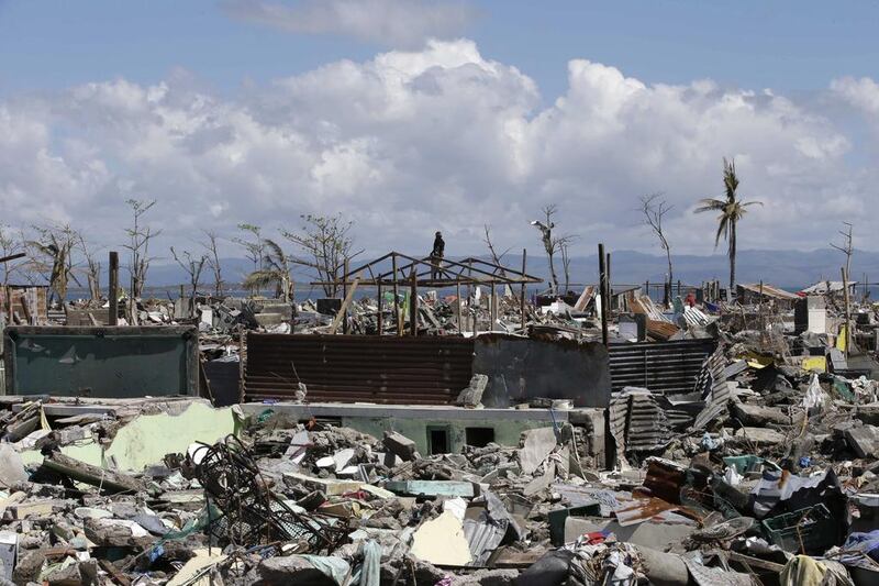 The devastation left by the typhoon in Tacloban in the Philippines – global warming may be increasing the intensity of such storms but no one can be sure as yet. Some scientists even believe the warming, manmade or not, is saving the planet from the next Ice Age, which is already over due. Bullit Marquez / AP Photo