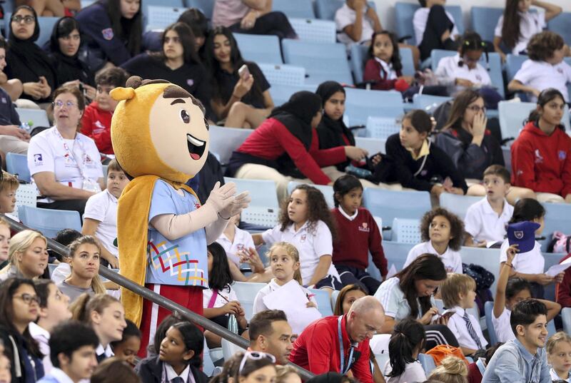 Dubai, United Arab Emirates - March 17, 2019: Supporters cheer for the athletes during the swimming at the Special Olympics. Sunday the 17th of March 2019 Hamden Sports Complex, Dubai. Chris Whiteoak / The National