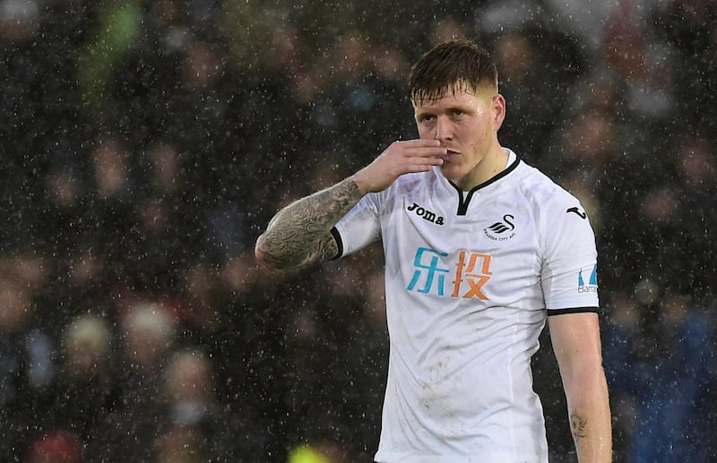 Swansea City's Alfie Mawson has been called up to the last two England squads. Rebecca Naden / Reuters