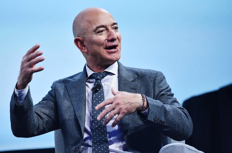 Jeff Bezos, 58, is the founder of Amazon shopping website and is worth $113.8bn. AFP