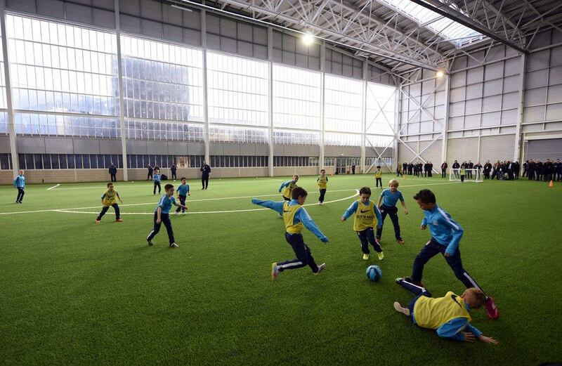 Manchester City academy youth products play at the newly opened indoor performance centre at the City Football Academy on Monday. AFP