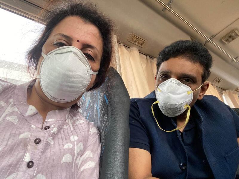 Dr JS Rajkumar and his wife Chitrakala on their way to an isolation centre in Dubai's Warsan area where they are part of a team of volunteers taking care of Covid-19 patients in a 500-bed facility made possible by contributions from the Indian community. Courtesy: Indian volunteers
