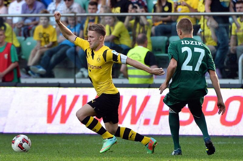 Jakub Blaszczykowski, left, pictured during a friendly against Slask Wroclaw on August 6, 2014, returned to Borussia Dortmund's line-up in the Uefa Champions League match against Anderlecht on December 9. Maciej Kulczynski / EPA