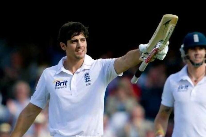 England's Alastair Cook reaches his 100 during the first day of the first cricket test match against South Africa at the Oval cricket ground, London, Thursday July 19, 2012. (AP Photo/Tom Hevezi) *** Local Caption *** Britain South Africa England Cricket.JPEG-0f9c2.jpg
