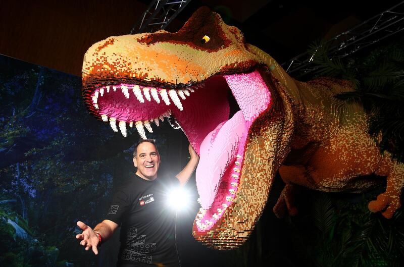 Ryan ‘The Brickman’ McNaught poses with his dinosaurs built from Lego in Melbourne, Australia. The exhibition transforms the blockbuster franchise Jurassic World into the largest Lego brick experience in Australian history. Getty