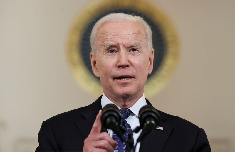 US President Joe Biden makes a brief appearance in the Cross Hall at the White House in Washington to welcome the Israel-Palestine ceasefire. Reuters