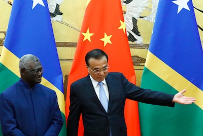 Solomon Islands' Prime Minister Manasseh Sogavare, left, and Chinese Premier Li Keqiang in Beijing, on October  9, 2019. AP