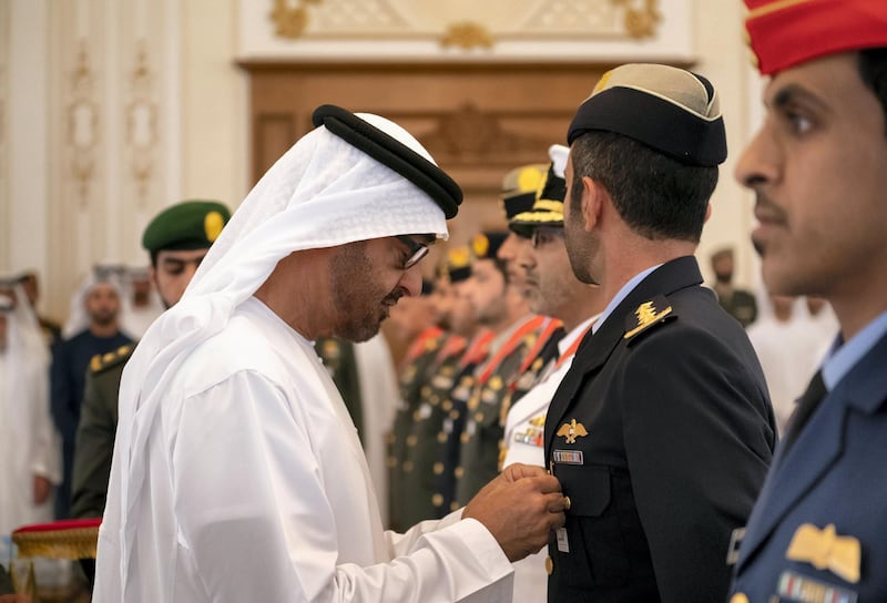 ABU DHABI, UNITED ARAB EMIRATES - April 08, 2019: HH Sheikh Mohamed bin Zayed Al Nahyan, Crown Prince of Abu Dhabi and Deputy Supreme Commander of the UAE Armed Forces (L), presents an Emirates Military Medal to HH Sheikh Mohamed bin Suroor Al Nahyan (R), during a Sea Palace barza.

( Ryan Carter / Ministry of Presidential Affairs )
---