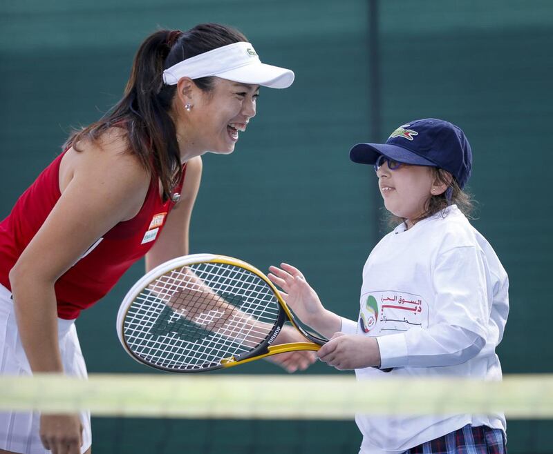 Latisha Chan at the Lacoste Special Needs Clinic. Courtesy Dubai Duty Free Tennis Championships