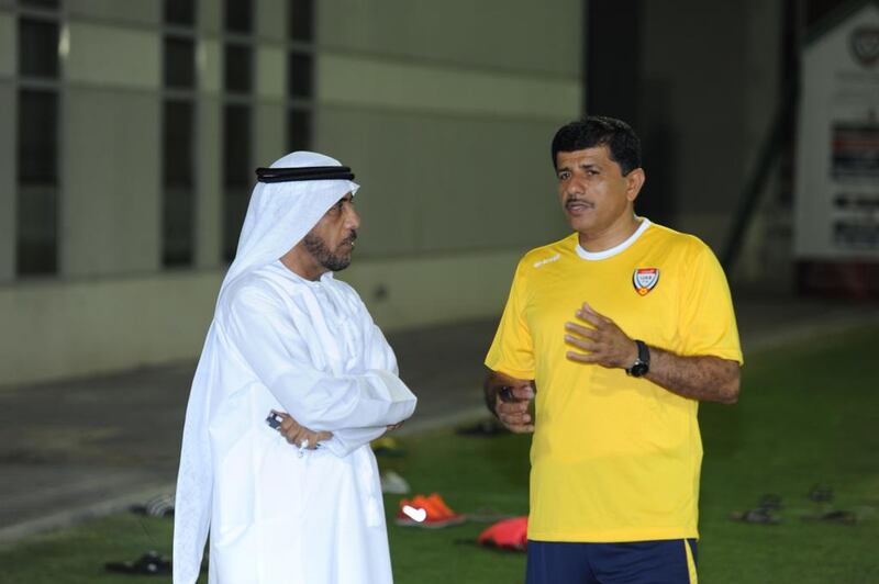 UAE Under 19 national team coach Abdullah Misfir, right, at training on June 25, 2014. Courtesy UAE FA