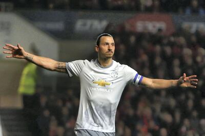 Manchester United's Swedish striker Zlatan Ibrahimovic celebrates scoring the team's first goal during the English League Cup quarter-final football match between Bristol City and Manchester United at Ashton Gate Stadium in Bristol, southwest England on December 20, 2017. (Photo by Geoff CADDICK / AFP) / RESTRICTED TO EDITORIAL USE. No use with unauthorized audio, video, data, fixture lists, club/league logos or 'live' services. Online in-match use limited to 75 images, no video emulation. No use in betting, games or single club/league/player publications. / 