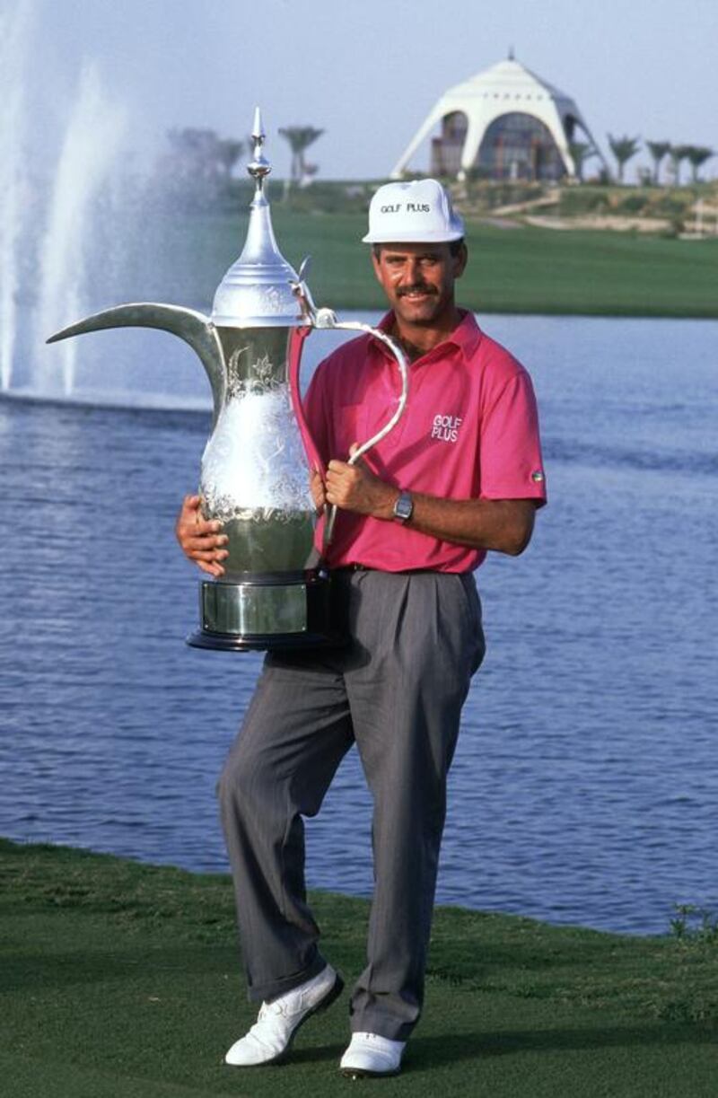 Mark James poses with the winning trophy after triumphing in the inaugural 1989 Dubai Desert Classic. Russell Cheyne / Allsport