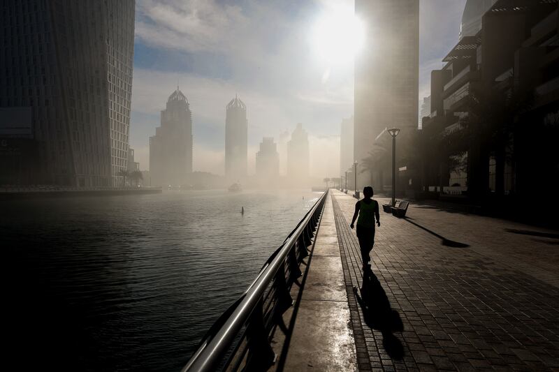 Heavy morning fog at Dubai Marina. Chris Whiteoak / The National
