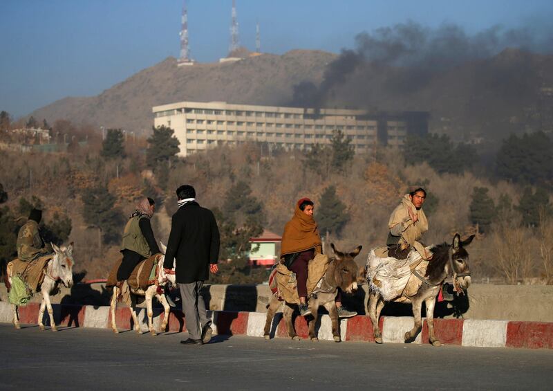 Smoke rises from the Intercontinental Hotel during an attack in Kabul, Afghanistan. Mohammad Ismail / Reuters