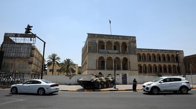 epa09231072 An Iraqi Army tank takes up position at the al-Tahrir square in central Baghdad, Iraq, 27 May 2021. Iraqi Special forces and tanks were deployed in across Baghdad and especialiy around the entrances of the heavily fortified Green zone area in Central Baghdad, shortly after a group of military vehicles affiliated with al-Hashd al-Shaabi (Popular Mobilization Forces) stormed the heavily fortified Green Zone in Baghdad, amid tension in the wake of the detention of Shiite militia commander, Qassem Musleh, on charges of terrorism and killed activists of protests in southern Iraq, according to judicial notes.  EPA/AHMED JALIL