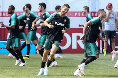 epa06846408 Portugal's national team player Cristiano Ronaldo (C) in action during the training session at the Kratovo training camp, which will be the Team Base Camp during the FIFA World Cup 2018 in Russia, Ramensky, Moscow, Russia, 28 June 2018.  EPA/PAULO NOVAIS