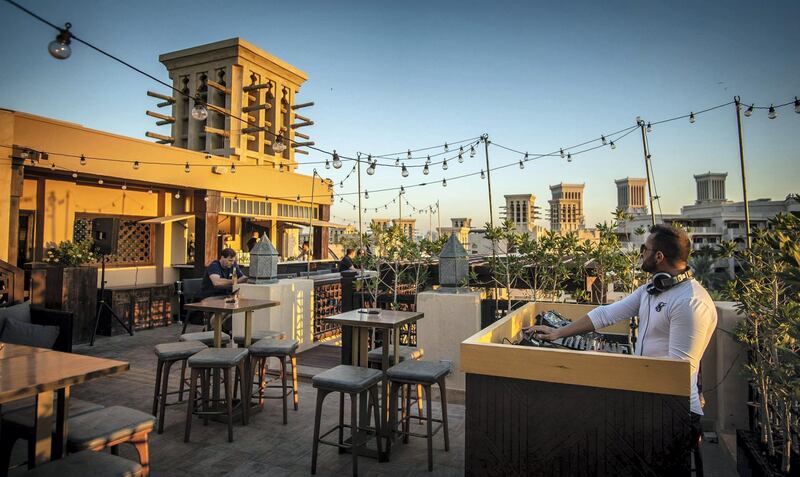 Folly's rooftop, located at Souk Madinat Jumeirah, is a top vantage point come golden hour. Photo: Folly