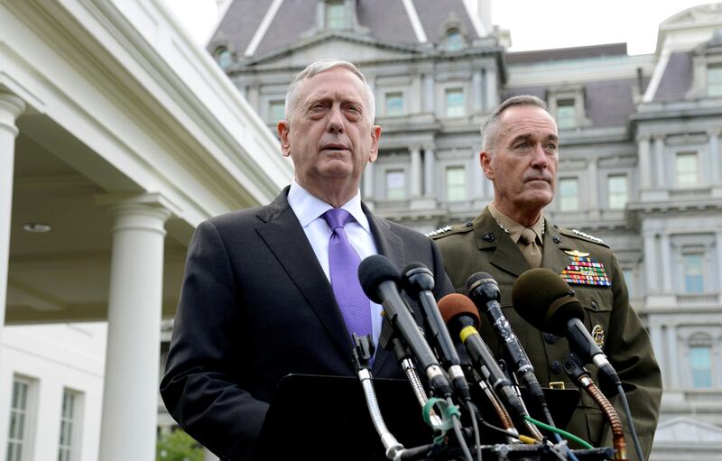 Secretary of Defense James Mattis (L) makes a statement outside the West Wing of the White House in response to North Korea's latest nuclear testing, as Chairman of the Joint Chiefs of Staff Gen. Joseph Dunford listens, in Washington, U.S., September 3, 2017.   REUTERS/Mike Theiler     TPX IMAGES OF THE DAY