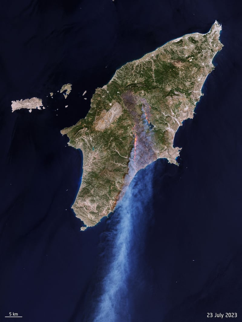 A trail of smoke above Rhodes where 10 per cent of the land has reportedly burned. AFP