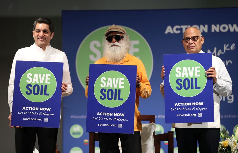 India's Sadhguru (centre) with  Dr Aman Puri, India's consul general in Dubai, and Suresh Kumar, head of the Indian Business and Professional Council, during an event in Dubai. 