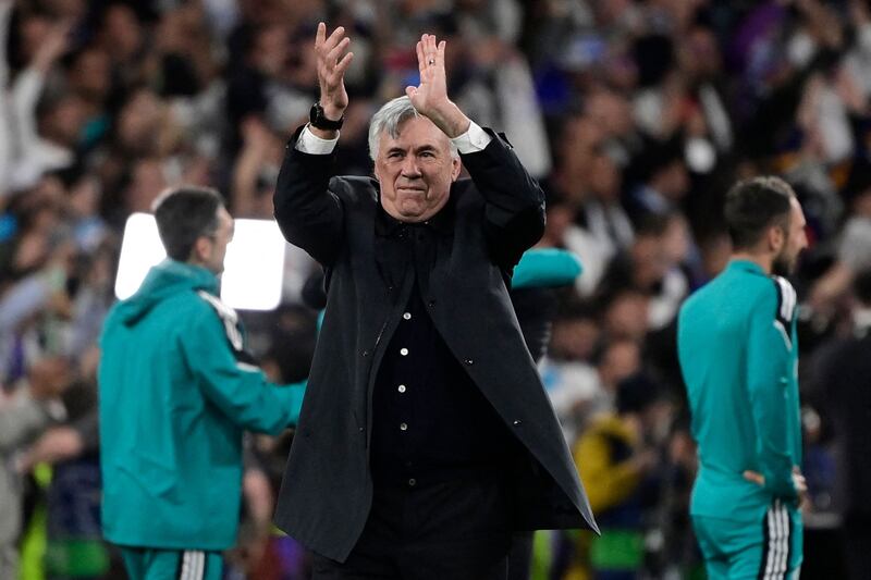 Real coach Carlo Ancelotti celebrates at the end of the match. AFP