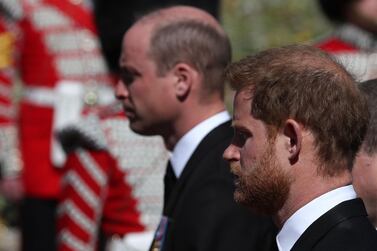 Prince William, Duke of Cambridge (left) and Prince Harry follow the coffin during the ceremonial funeral procession of Prince Philip. AFP