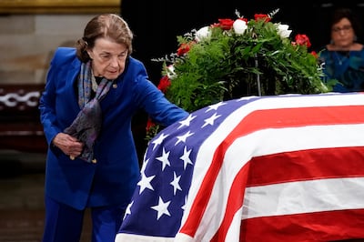 Dianne Feinstein pays her respects to former senator Bob Dole as he lies in state at the Rotunda of the US Capitol in Washington, December 2021. EPA