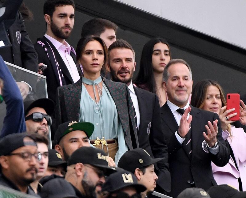 Inter Miami co-owner David Beckham and wife Victoria before the club's first MLS game against Los Angeles FC at Banc of California Stadium in March. AFP