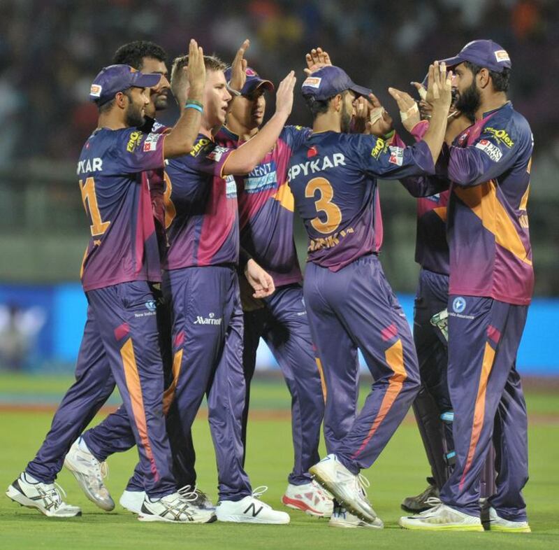 Rising Pune Supergiants bowler Adam Zampa, centre, celebrate with teammates against Sunrisers Hyderabad. Noah Seelam / AFP