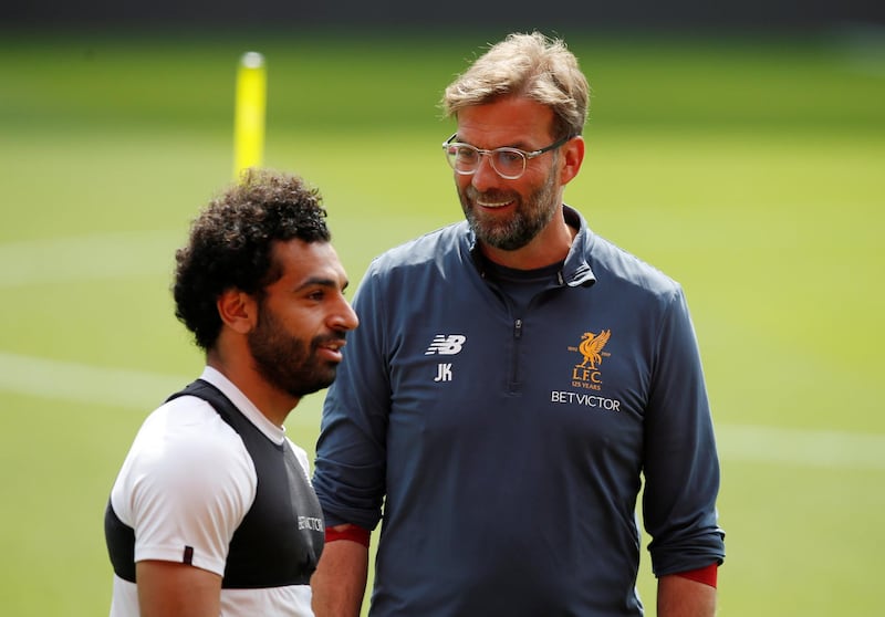 Liverpool manager Jurgen Klopp and Mohamed Salah during training. Andrew Yates / Reuters