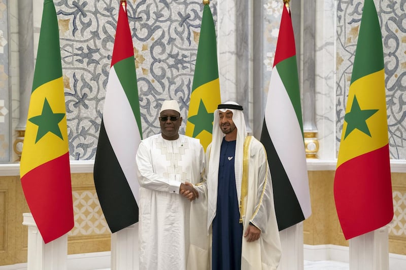 ABU DHABI, UNITED ARAB EMIRATES - February 06, 2020: HH Sheikh Mohamed bin Zayed Al Nahyan, Crown Prince of Abu Dhabi and Deputy Supreme Commander of the UAE Armed Forces (R) and HE Macky Sall, President of Senegal (L), stand for a photograph, at Qasr Al Watan.

( Mohamed Al Hammadi / Ministry of Presidential Affairs )
---