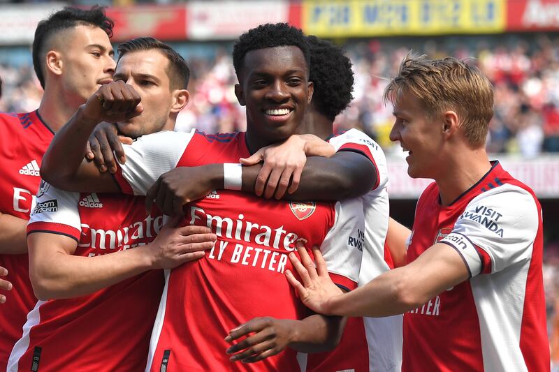 Eddie Nketiah (C) of Arsenal celebrates with teammates after scoring the opening goal during the English Premier League soccer match between Arsenal FC and Leeds United in London, Britain, 08 May 2022.   EPA/VINCE MIGNOTT EDITORIAL USE ONLY.  No use with unauthorized audio, video, data, fixture lists, club/league logos or 'live' services.  Online in-match use limited to 120 images, no video emulation.  No use in betting, games or single club / league / player publications