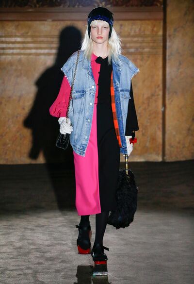 Sport a cut-off stonewashed denim jacket over a simple dress. Courtesy Gucci