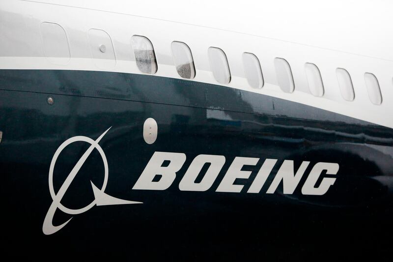 (FILES) In this file photo taken on March 7, 2017 the Boeing logo on the Boeing 737 MAX 9 plane during its rollout for media at the Boeing factory in Renton, Washington. 
Partnership talks between Boeing and Brazilian aircraft manufacturer Embraer are making progress but there is "still work to do," Boeing CEO Dennis Muilenburg said February 15, 2018. Boeing is pursuing a deal with Embraer which would give the American aerospace giant access to the Brazilian company's line of smaller jets -- helping it compete with Canada's Bombardier, which has a partnership with Boeing European rival Airbus. / AFP PHOTO / Jason Redmond