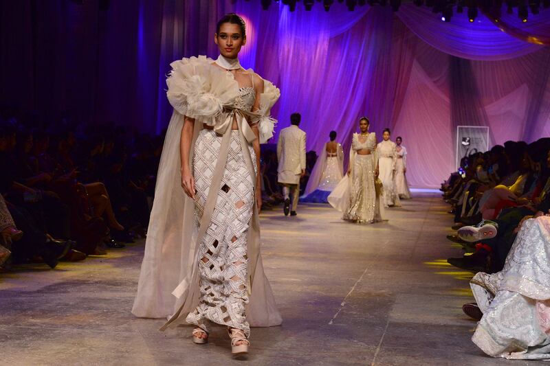 A model presents a creation by Manish Malhotra.