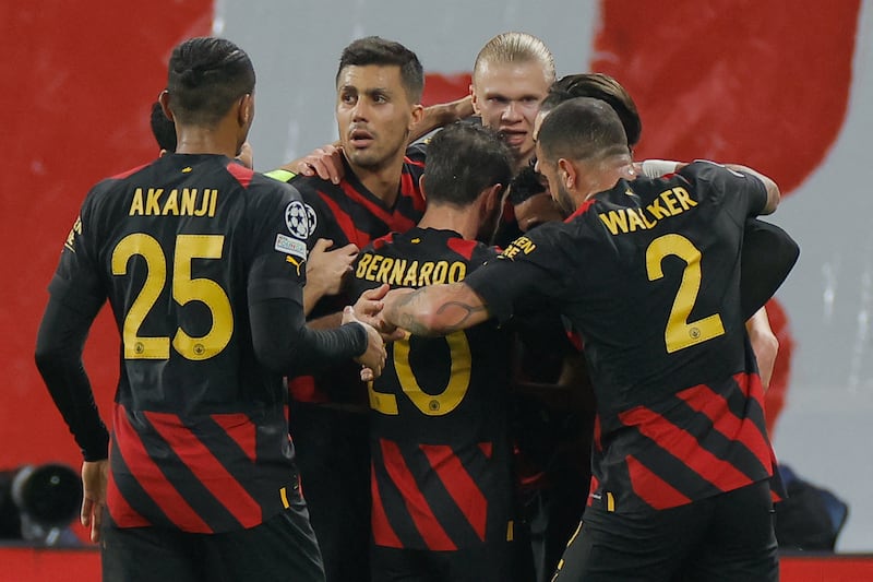 Riyad Mahrez and teammates celebrate taking the lead. AFP