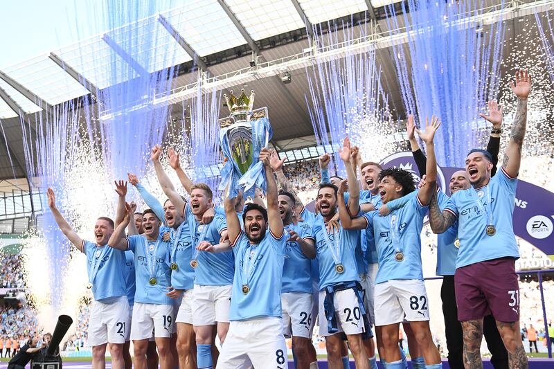 Manchester City players celebrate after the match. Getty