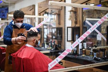 Hairdressers have reopened in Germany after a nearly three-month closure. AFP 