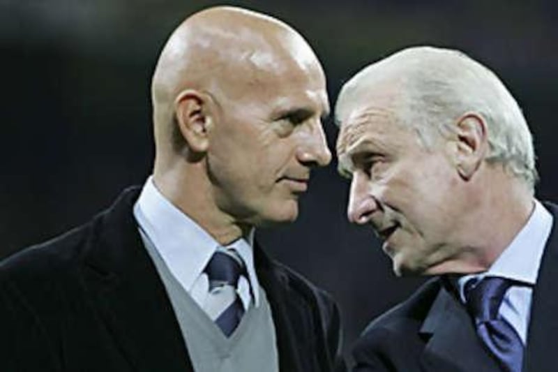 Arrigo Sacchi, left, pictured with another former Italy manager Giovanni Trapattoni.