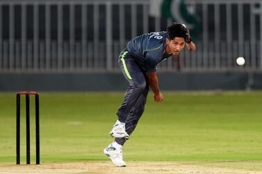 (FILES) In this file photo taken on September 11, 2021 Pakistan's Mohammad Hasnain attends a practice session at the Rawalpindi Cricket Stadium in Rawalpindi, ahead of their first one-day international (ODI) cricket match against New Zealand. - Pakistan paceman Mohammad Hasnain was suspended on February 4, 2022 from bowling at international level after biomechanical testing confirmed his action was illegal, the country's cricket board said. (Photo by Farooq NAEEM / AFP)