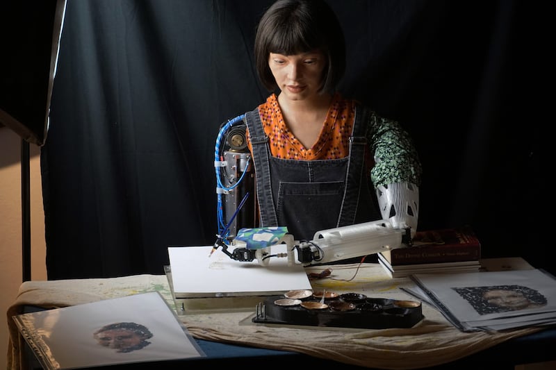 The Ai-Da robot, the world's first ultra-realistic humanoid robot, on view for a show organised by the Concilio Europeo dell'Arte (Council of Europe) at the 59th International Art Exhibition in Venice, Italy, on April 20, 2022. EPA