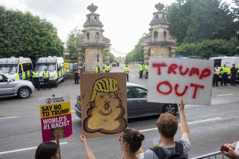 Protesters gather at the gates of Blenheim Palace. Getty Images