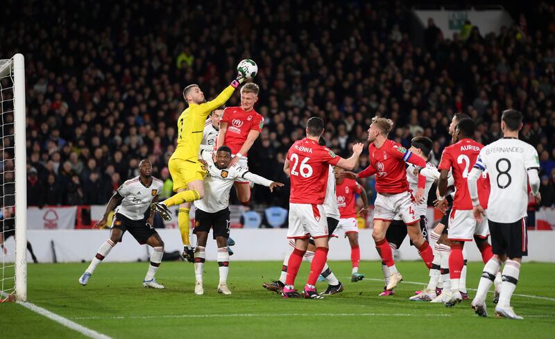 United goalkeeper David De Gea punches the ball clear. Getty