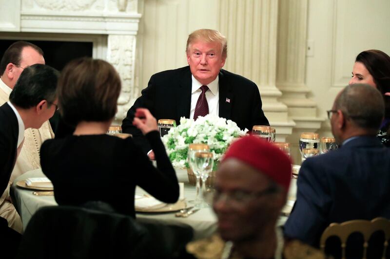 President Donald Trump joins an iftar dinner, which breaks a daylong fast, celebrating Islam's holy month of Ramadan, in the State Dining Room of the White House in Washington, Monday, May 13, 2019. (AP Photo/Manuel Balce Ceneta)