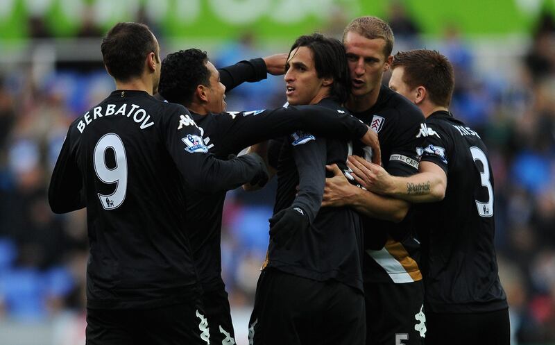 READING, ENGLAND - OCTOBER 27:  Bryan Ruiz (C) of Fulham is congratulated by his team-mates after scoring their first goal during the Barclays Premier League match between Reading and Fulham at Madejski Stadium on October 27, 2012 in Reading, England.  (Photo by Christopher Lee/Getty Images) *** Local Caption ***  154835068.jpg
